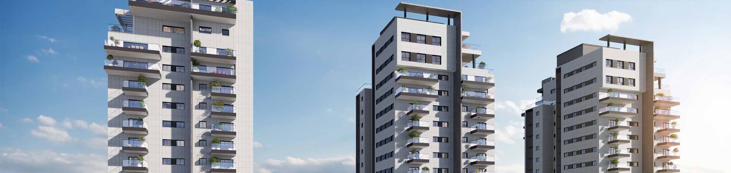 Netanya U — three towers against blue sky